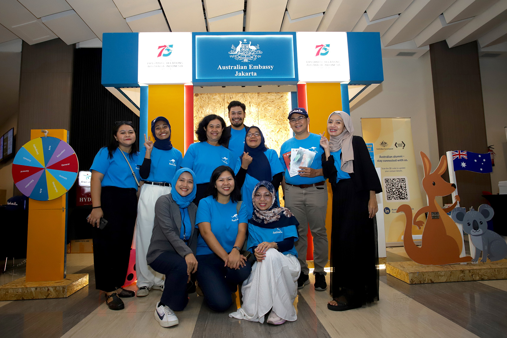 We are ready! The morning AAI and Embassy team strikes a pose before kicking off a day filled with fun and meaningful engagement with visitors at the booth