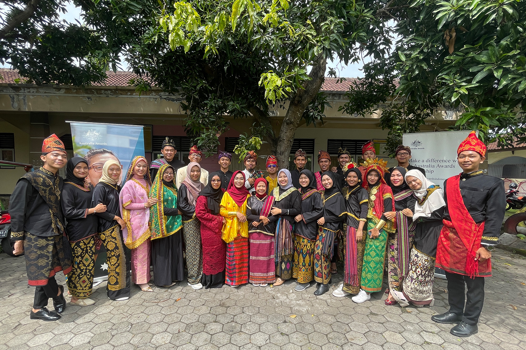 Wrapping up the ELTA program in Mataram, participants dress in traditional local costumes for a group photo.