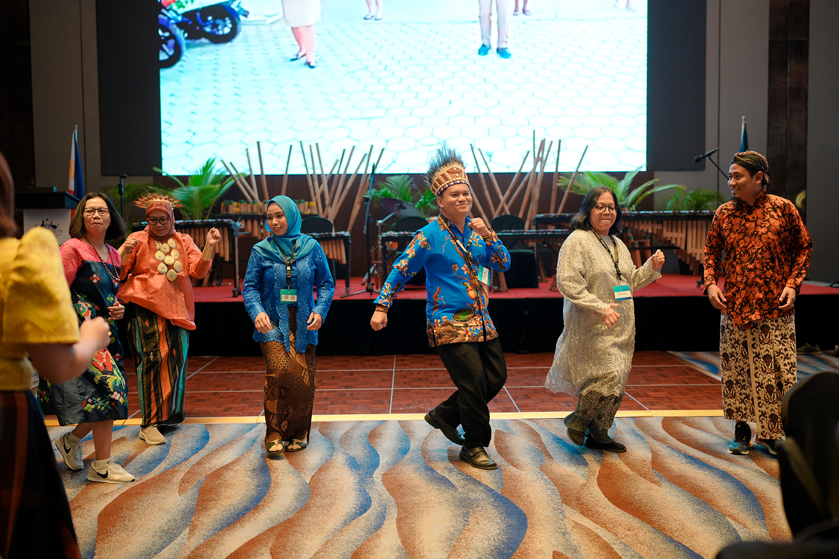 Indonesian delegates take the stage to showcase Indonesia's culture through dance performances.