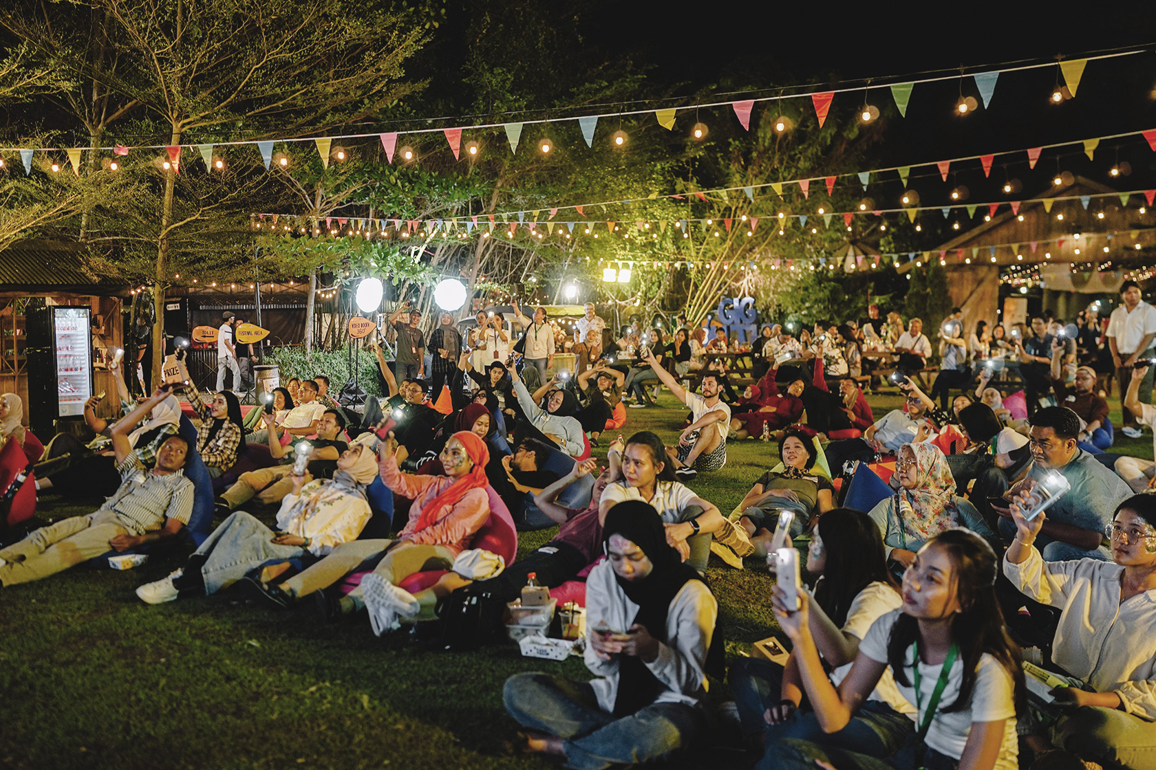 The vibrant atmosphere of Gig on the Green illuminated the night, with lively music and shared moments creating an unforgettable experience.