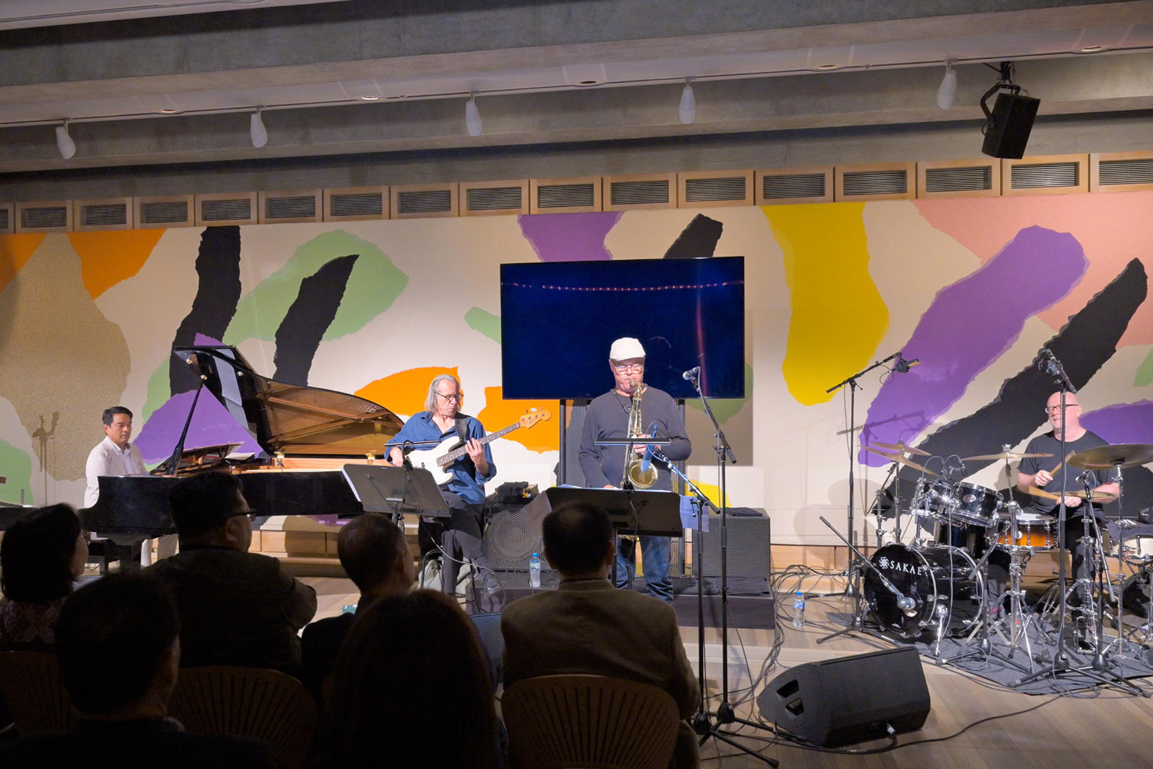 Indra Lesmana shares the stage with his friends, Steve Hunter (bass), Dale Barlow (saxophone), and Andrew Gander (drums) at the Sydney Reunion performance.