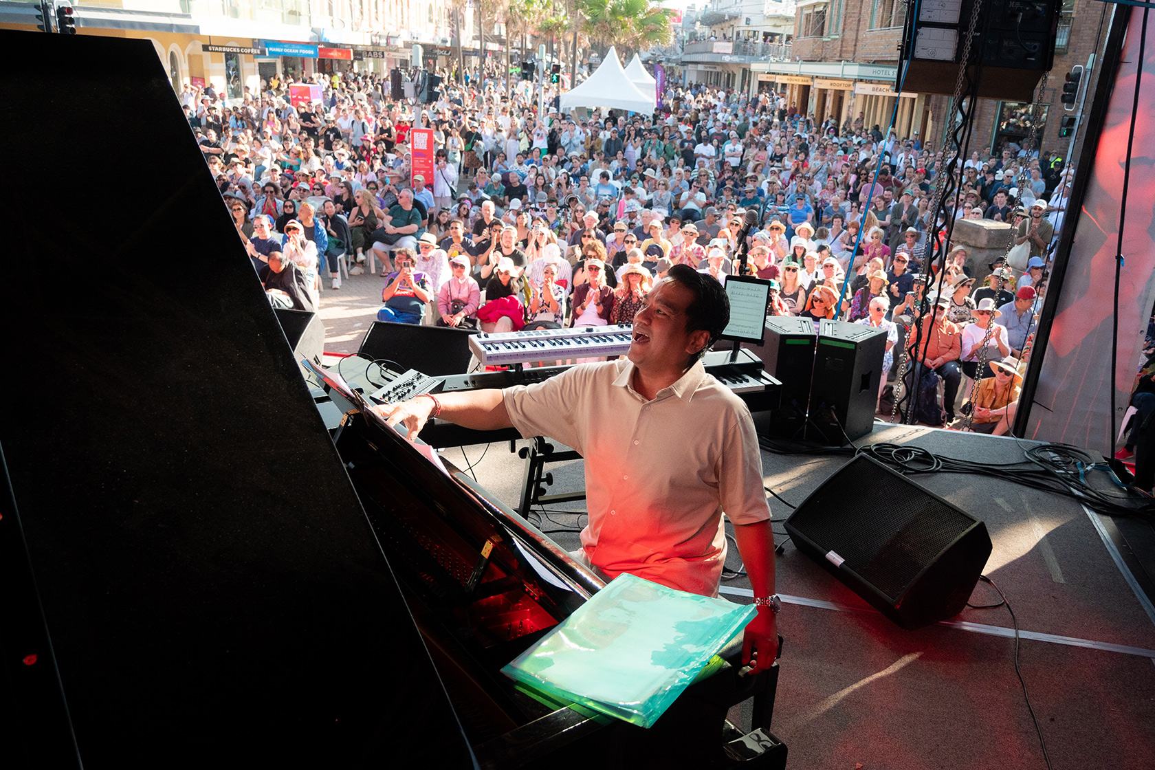 Indra Lesmana performs with great enthusiasm in front of large crowds at a music festival in Australia.