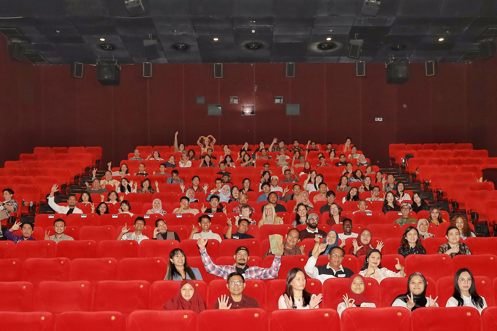 Cinematic vibes and great company—alumni and friends enjoy every scene together in Surabaya.