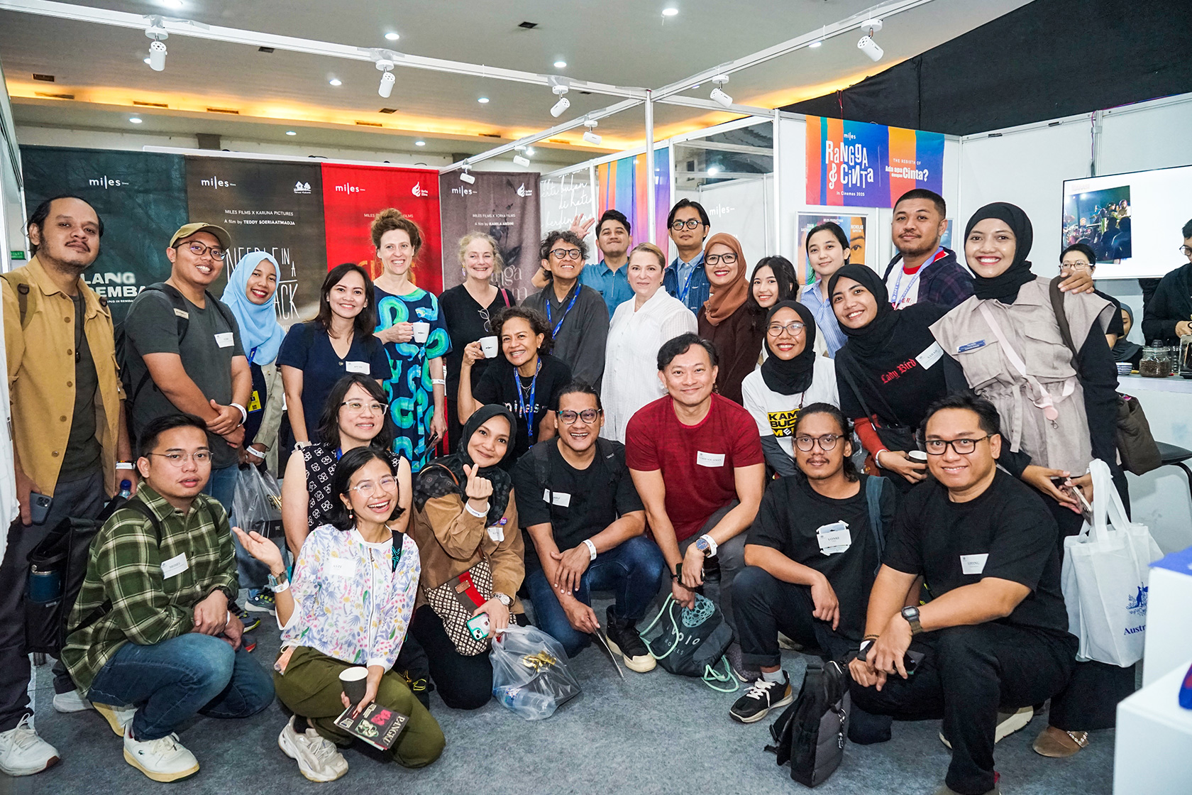 All smiles as participants come together for a group photo at the vibrant Jogja-NETPAC Asian Film Festival (JAFF) Market!