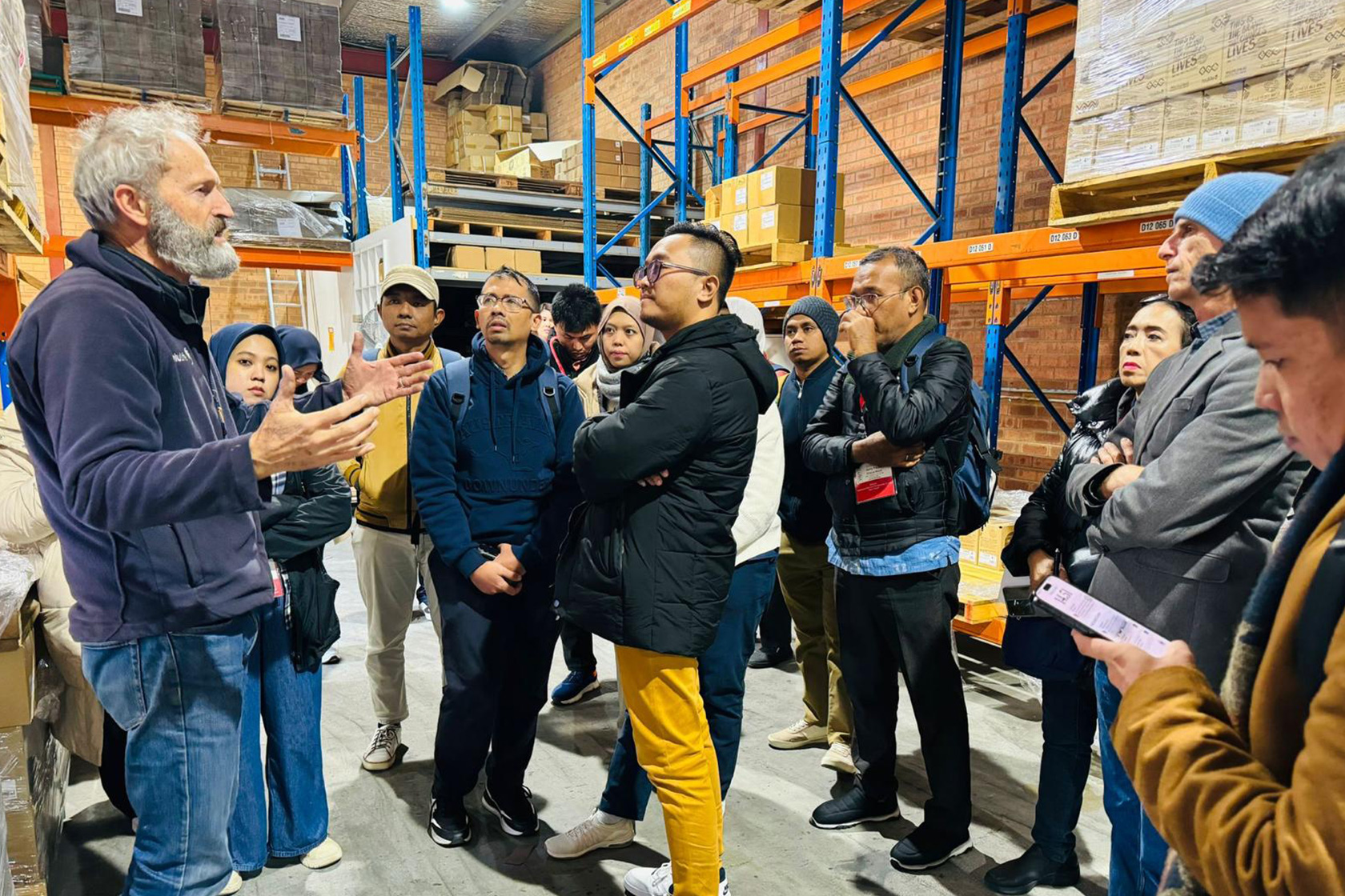 Short course participants interact with experts from Kokonut Pacific during an industrial visit.