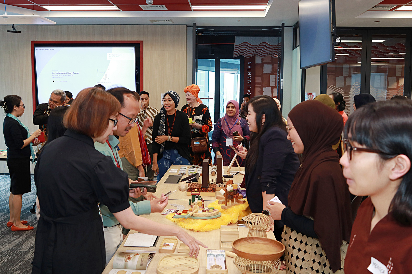 Women business leaders from MSMEs across Indonesia showcase their products while building connections during the course.