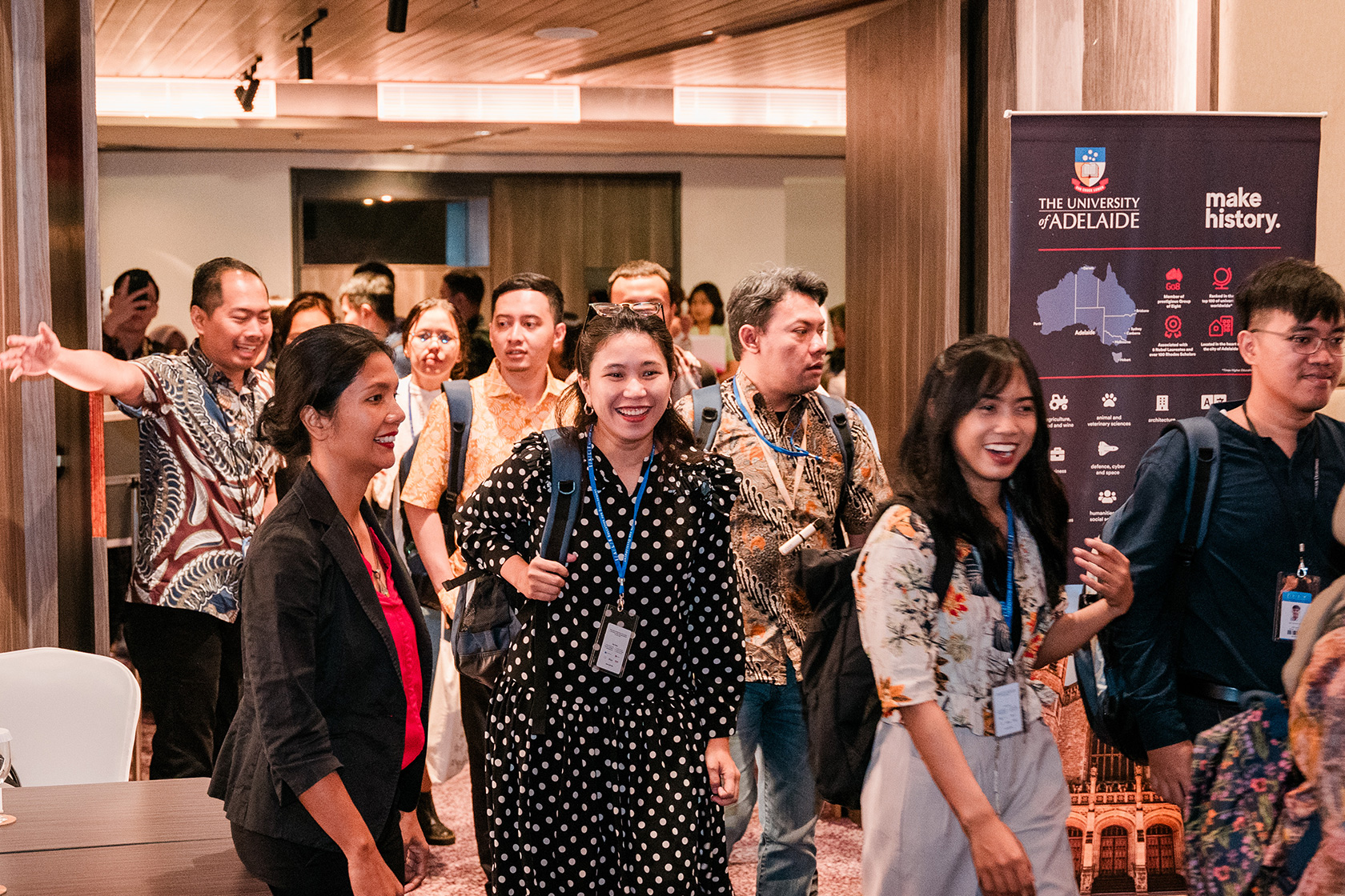 Excitement exudes as Australia Awards scholars enter the venue for the University Info Day.