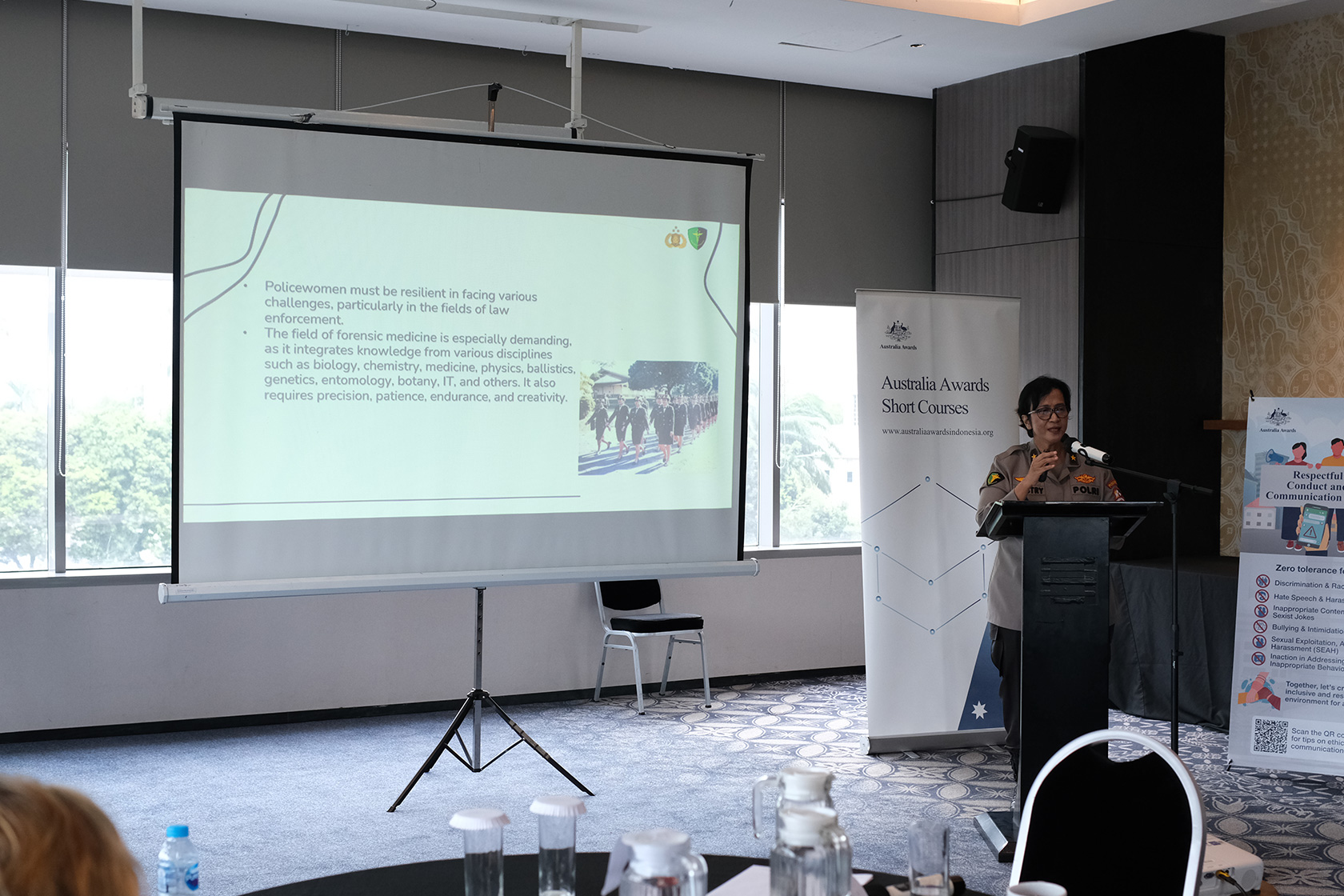 Brigadier General Dr Sumy Hastry Purwanti, Head of the Medical and Health Laboratory Division at Pusdokkes Polri, highlights challenges and opportunities for women in the security sector during her presentation.