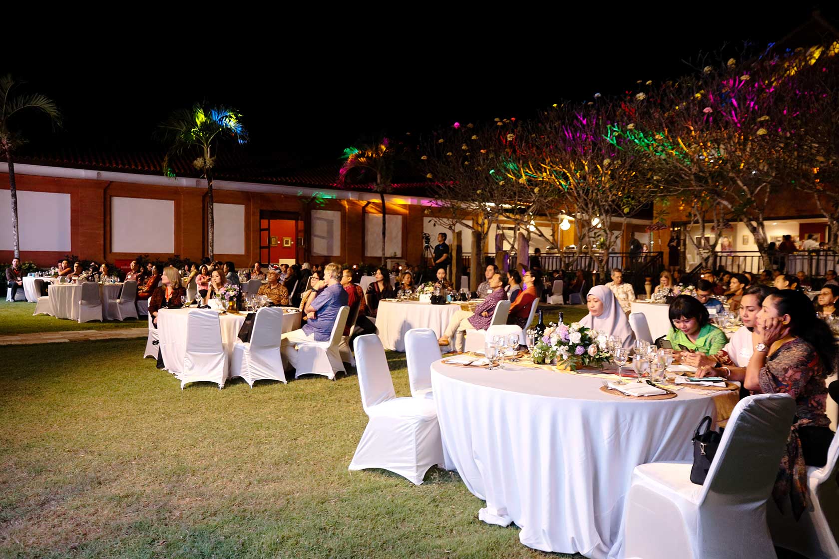 The Gala Dinner in Bali blossoms with a garden party theme, radiating a heartwarming ambience.