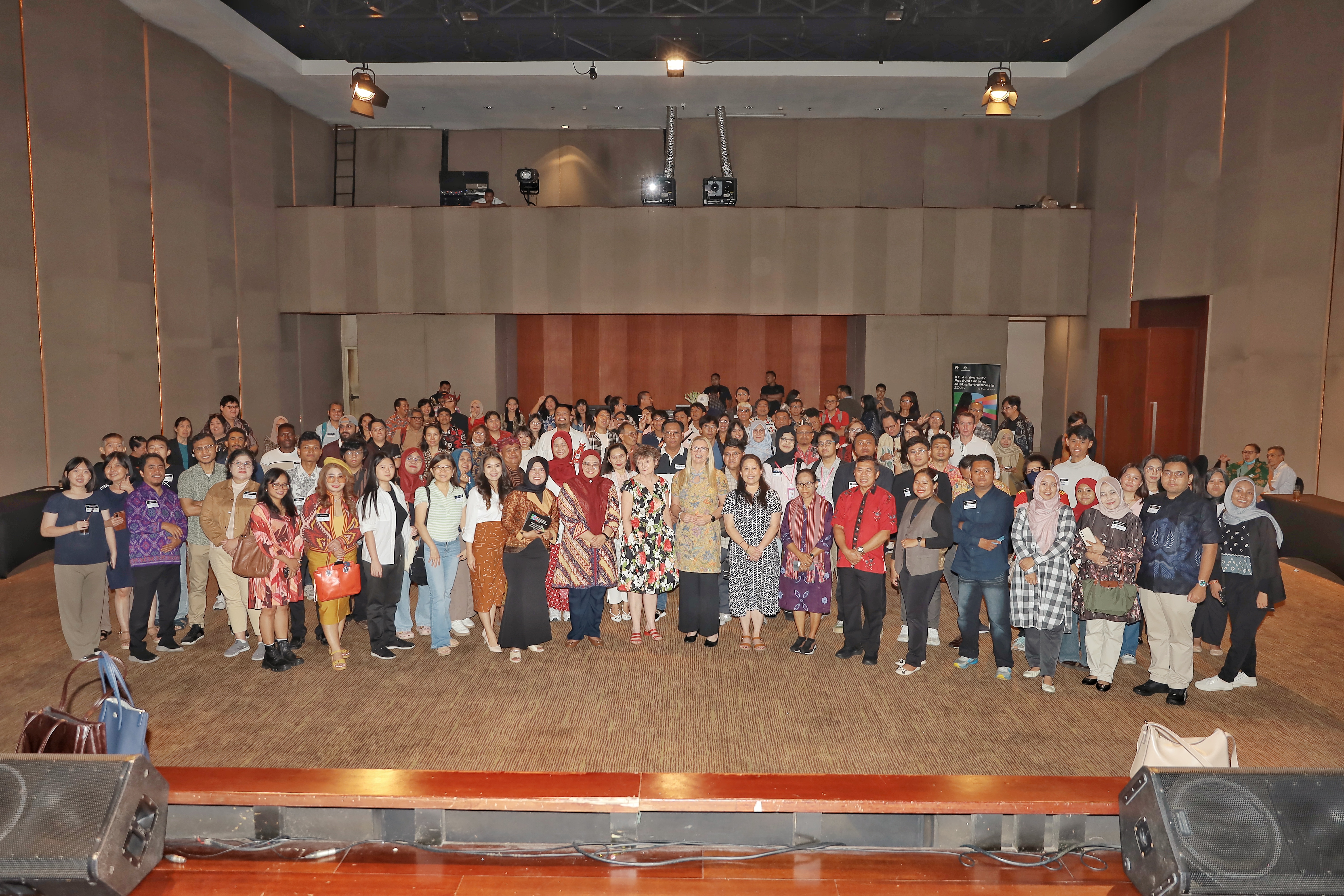 Cinematic vibes and great company—alumni and friends enjoy every scene together in Surabaya.